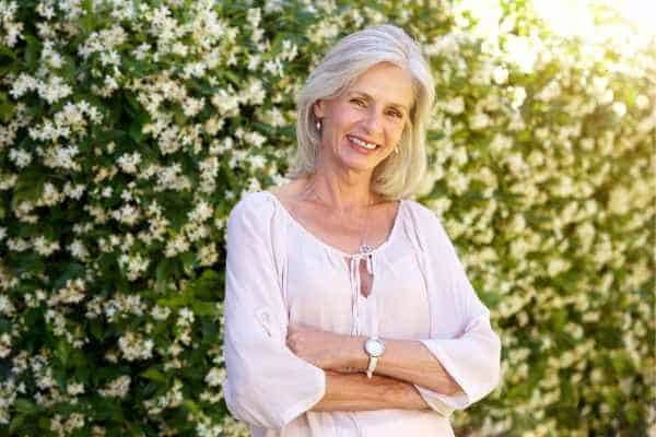Older woman happy with urinary incontinence treatment Dorchester